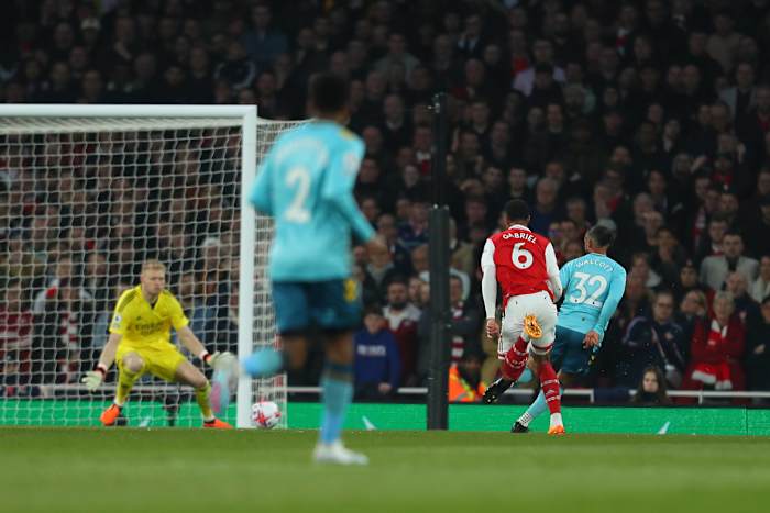 Theo Walcott pictured (right) scoring for Southampton against Arsenal in April 2023